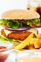 Chicken burger and glass of cola