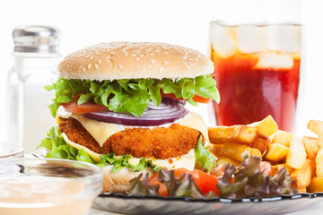 Chicken burger and glass of cola