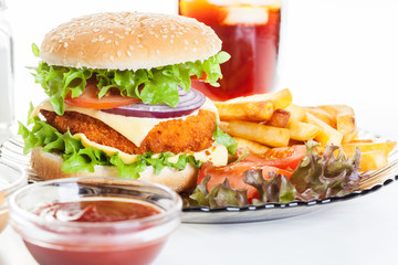 Chicken burger and glass of cola