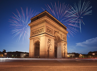 Fototapeta na wymiar Arc de Triomphe, Paris lit up by Fireworks