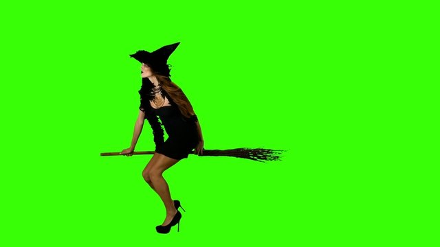 Halloween witch flying on a broomstick green screen