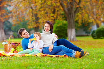 happy family together on autumn picnic