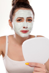 young woman posing with face mask