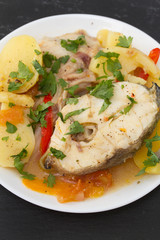 fish stew on white plate
