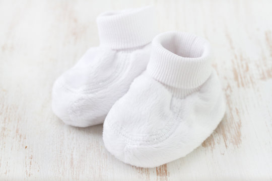 White Baby Socks On White Background