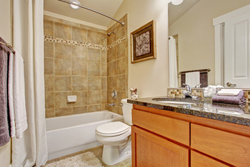 Bathroom with tile wall trim