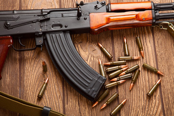 Kalashnikov assault rifles with ammunition - obrazy, fototapety, plakaty
