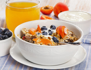 Muesli with yogurt  and fresh berries.Traditional healthy breakf