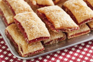 Fototapeta na wymiar baking crispy toast with sugar and strawbery jam