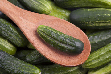 Cucumber in a wooden spoon