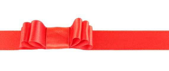 Red ribbon and red bow isolated on white