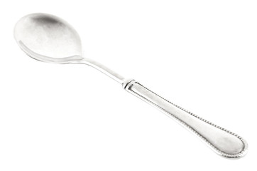 Metal teaspoon isolated on white