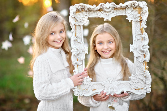 portrait of two  little  girls in a Christmas style