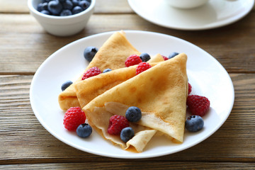 crepes with raspberries, blueberries,