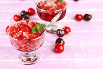 Closeup of cherry granita in glass bowls,