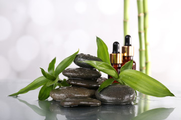 Spa stones, bamboo branches and aroma oil
