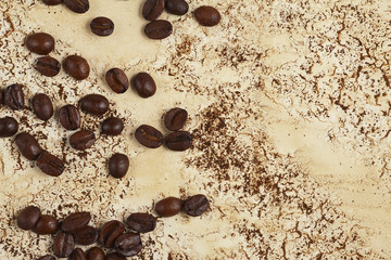 coffee beans on abstract background with streaks and stains