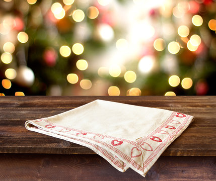 rustic table over christmas bokeh for product montage