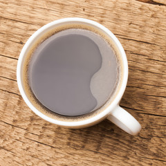 Coffee cup on wooden table - 1 to 1 ratio