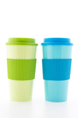 Plastic coffee mug isolated on white background