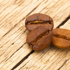 Coffee beans on old table - 1 to 1 ratio