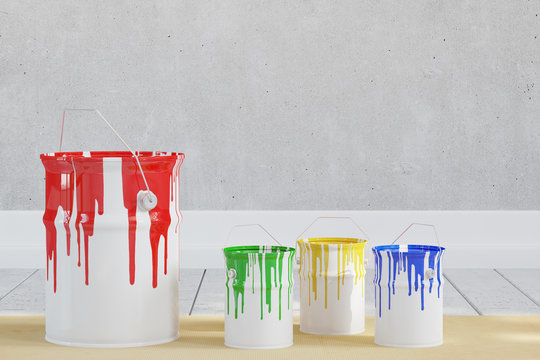 Eimer mit verschiedenen Farben vor Wand
