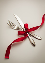 Fork and knife with decorative ribbon