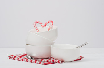 Christmas Candy Cane. White Bowls. Red White Napkin