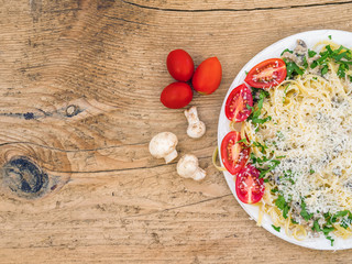 Fresh Italian pasta with mushrooms and cream sauce