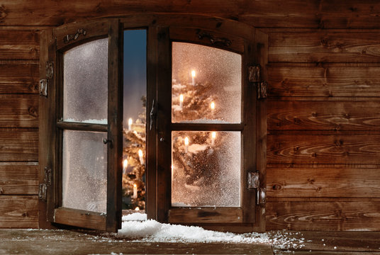 Snow at Open Wooden Christmas Window Pane
