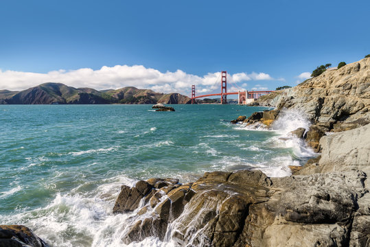 Sea, rocks and bridge  Golden Gate
