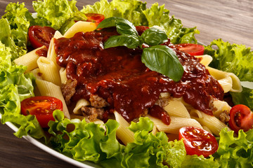 Pasta with meat, tomato sauce and vegetables