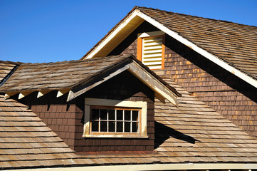 Framed window on a house roof. California. USA.