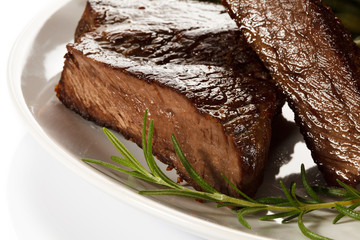 Beefsteak, chips and vegetables
