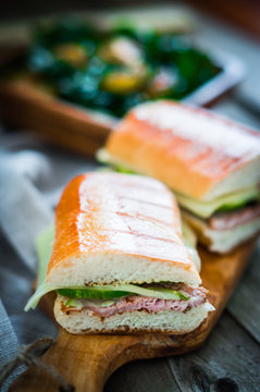 Cuban sandwiches on wooden background
