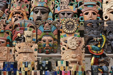 Obraz premium Muliticolored Maya masks - souvenir stall - Chichen Itza – Mexico