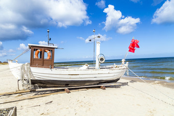 fishermans boat at the beach of the baltic sea
