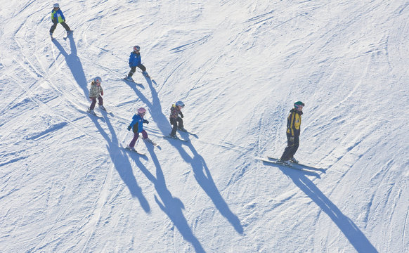 Instructor with a group of children. Austria