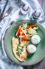 Fish with rice and vegetables