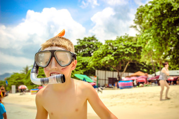 Obraz na płótnie Canvas little boy on the beach in snorkeling mask. Koh Samui Thailand
