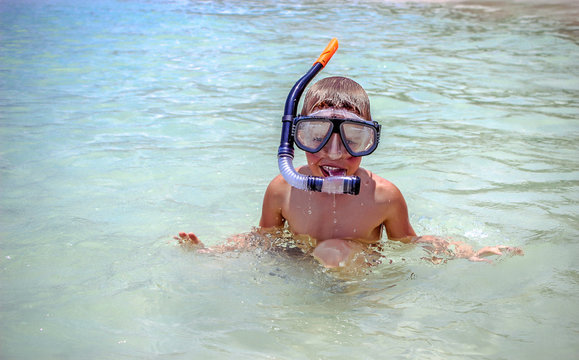little boy snorkeling with an underwater mask on Koh Samui