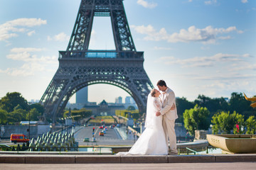 Bride and groom in Paris, near the Eiffel tower