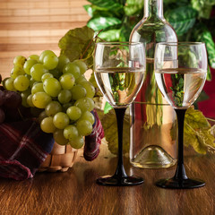 Bottle and glasses of white wine