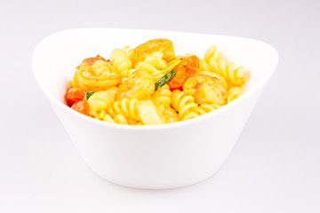 fusilli with curry, shrimps, zucchini and cherry tomato