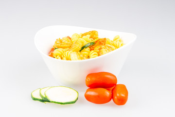 fusilli with curry, shrimps, zucchini and cherry tomato