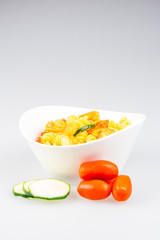 fusilli with curry, shrimps, zucchini and cherry tomato