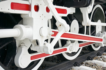 Wheel of train with white and red mechanism