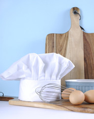 Fototapeta na wymiar Modern kitchen cooking kitchenware and chef's hat