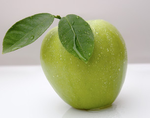green apple with water drop