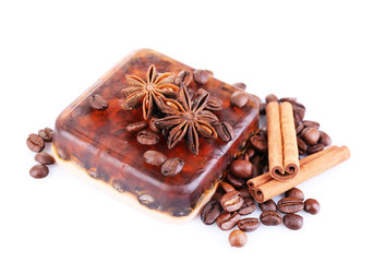 Organic soap with coffee beans and spices, isolated on white